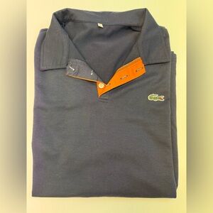 T354- Lacoste Men's Polo in Dark Blue with Orange Trim